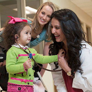 Medical student with child and mother